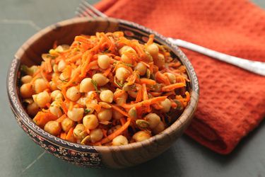 A bowl of chickpea and carrot salad