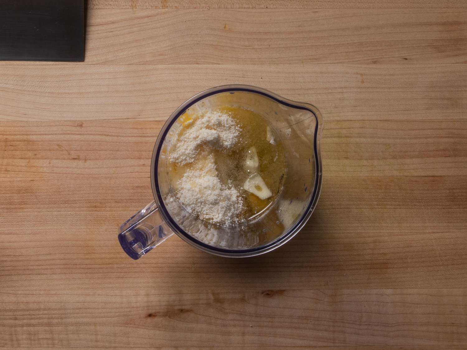 The dressing ingredients in the blender pitcher right before blending.