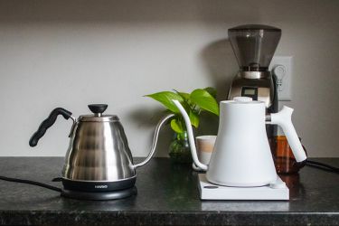 two electric gooseneck kettles on a countertop