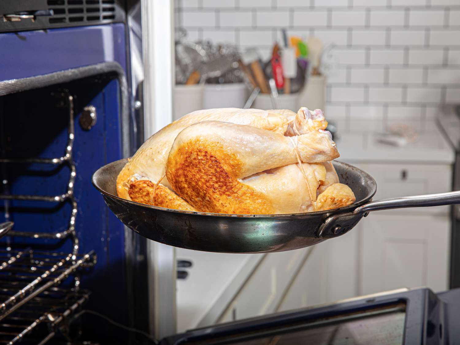 Placing a chicken in the oven