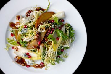 Roasted Pear Salad with Endive, Pomegranate, Blue Cheese, and Hazelnut Vinaigrette