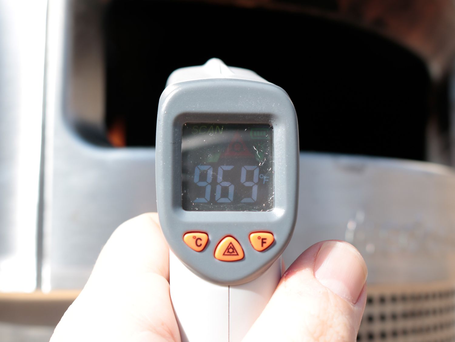 an infrared thermometer reads 969ÂºF