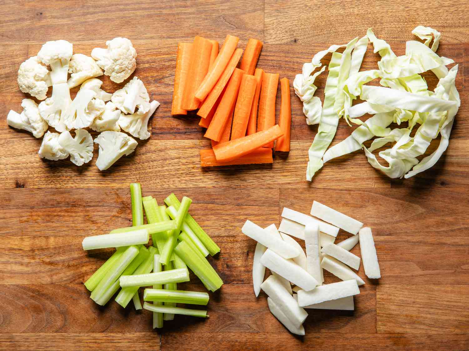 Overhead view of cut vegetables on a cutting board