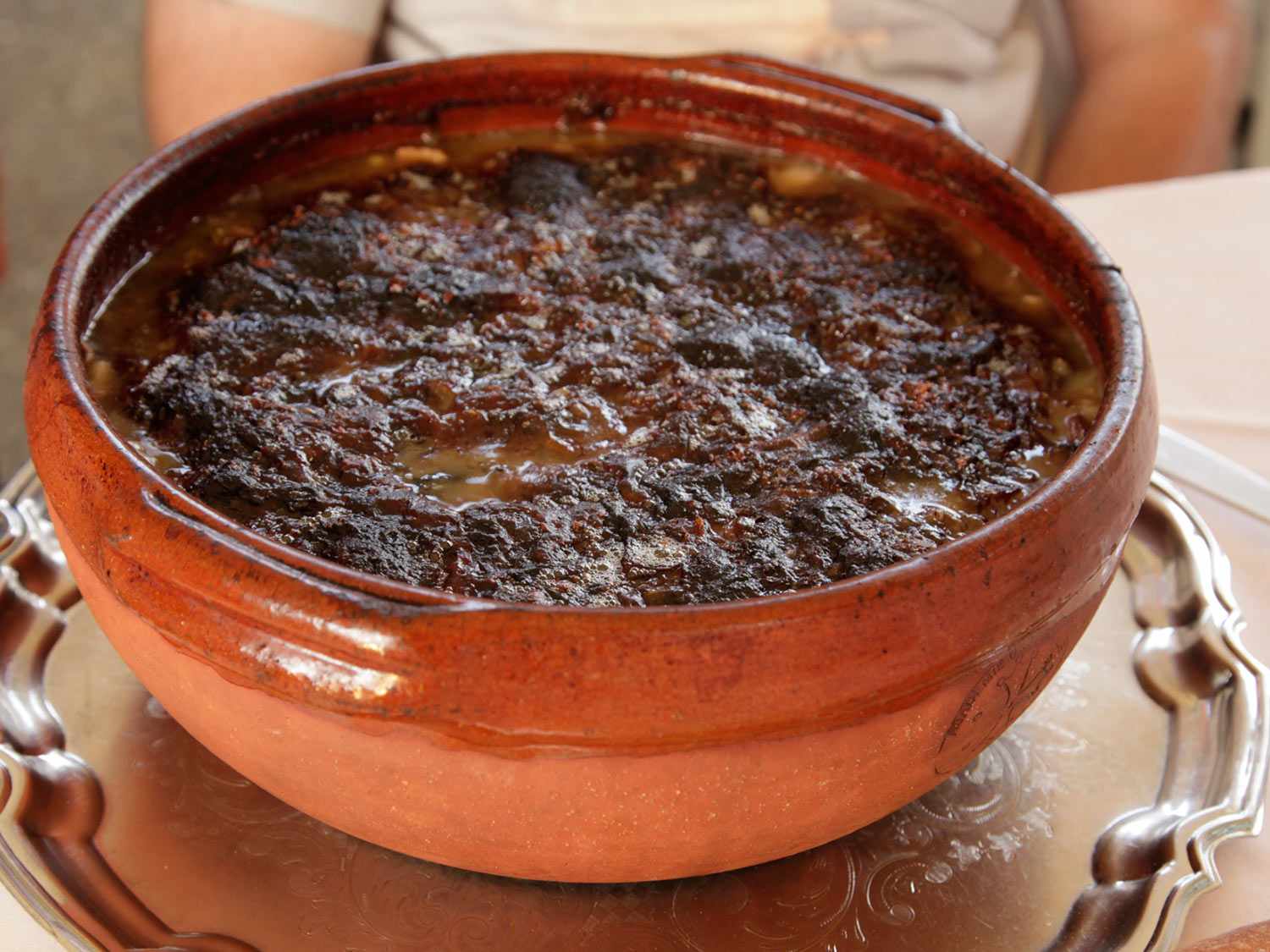 Cassoulet served in an earthenware dish in Languedoc, France.