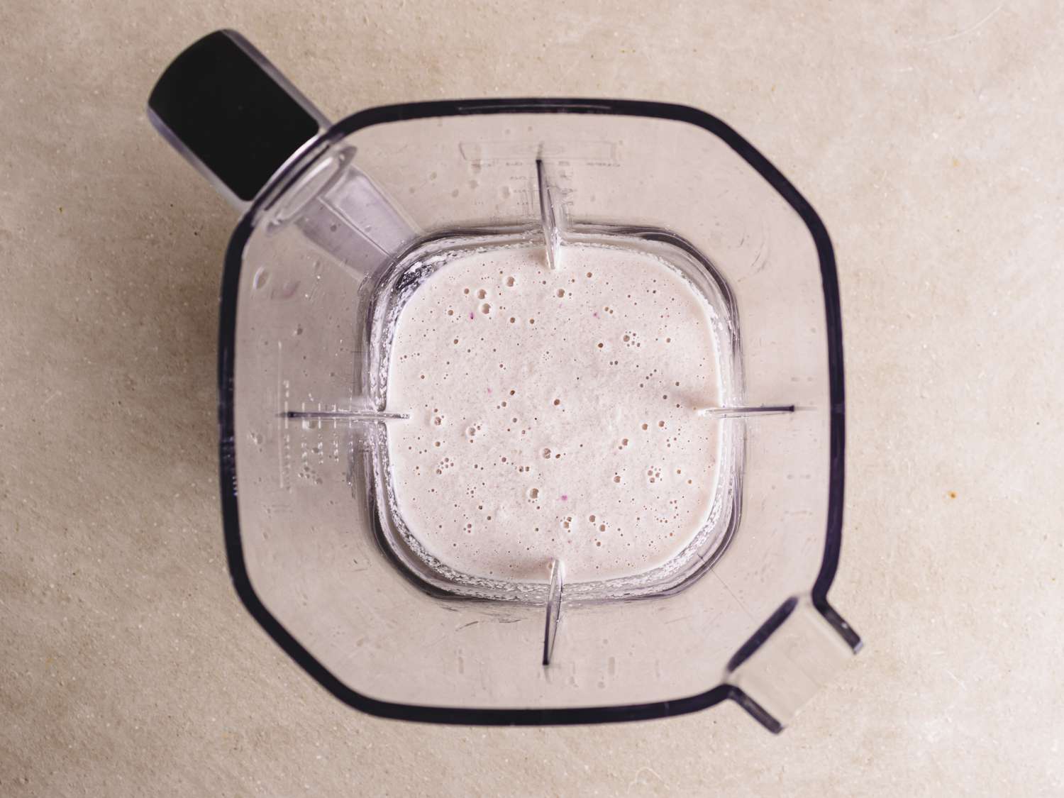Overhead view into blender with masa batter