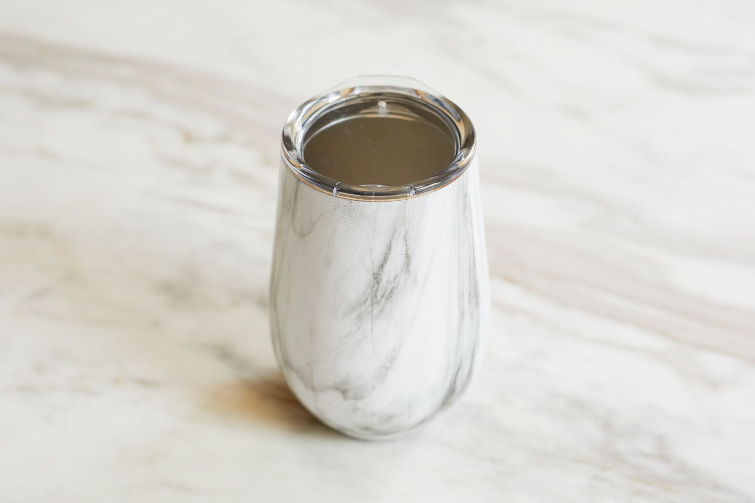 a grey and white wine tumbler