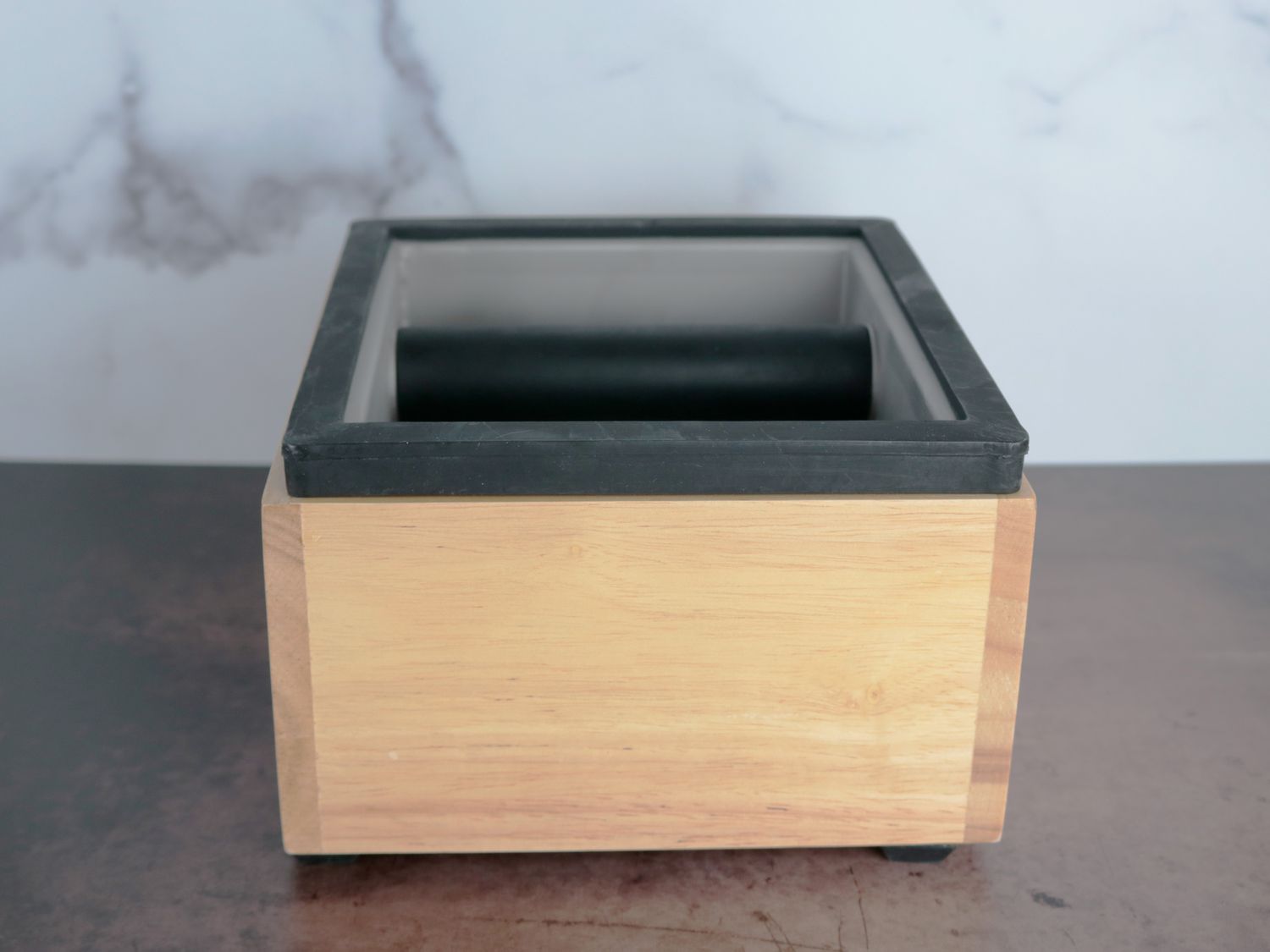 the rattleware knock box on a marble background