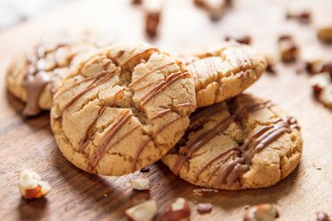 Hazelnut sugar cookies drizzled with milk chocolate