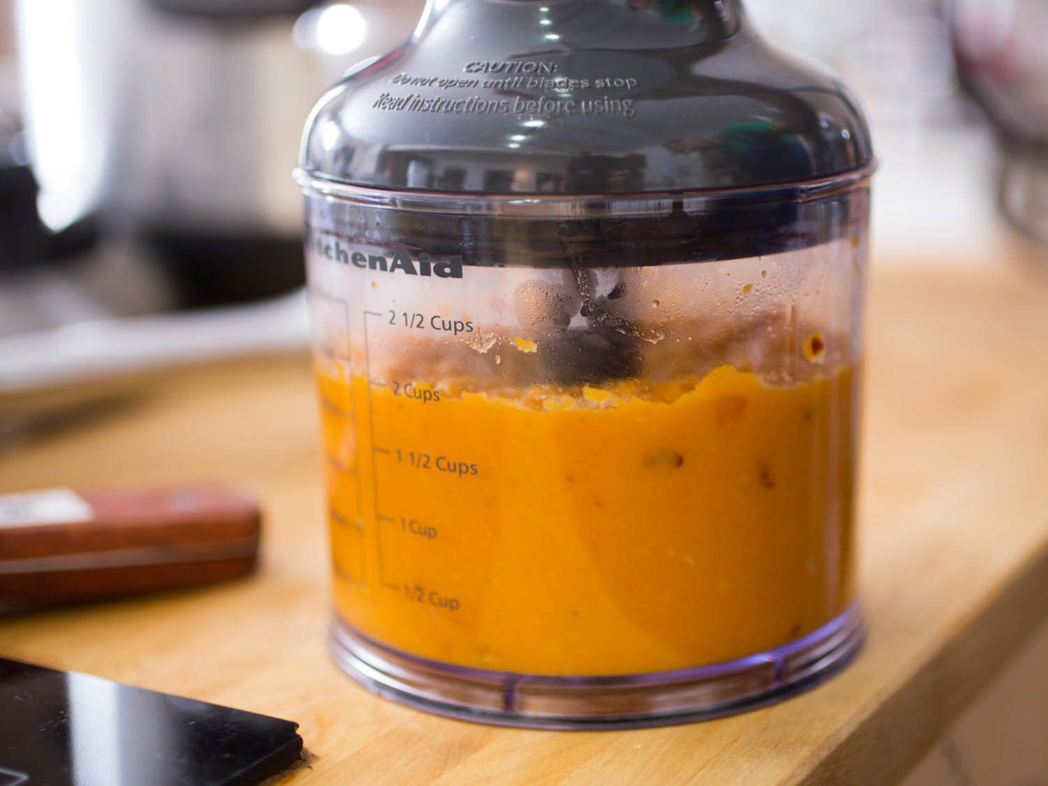 Roasted butternut squash purée in a blender canister