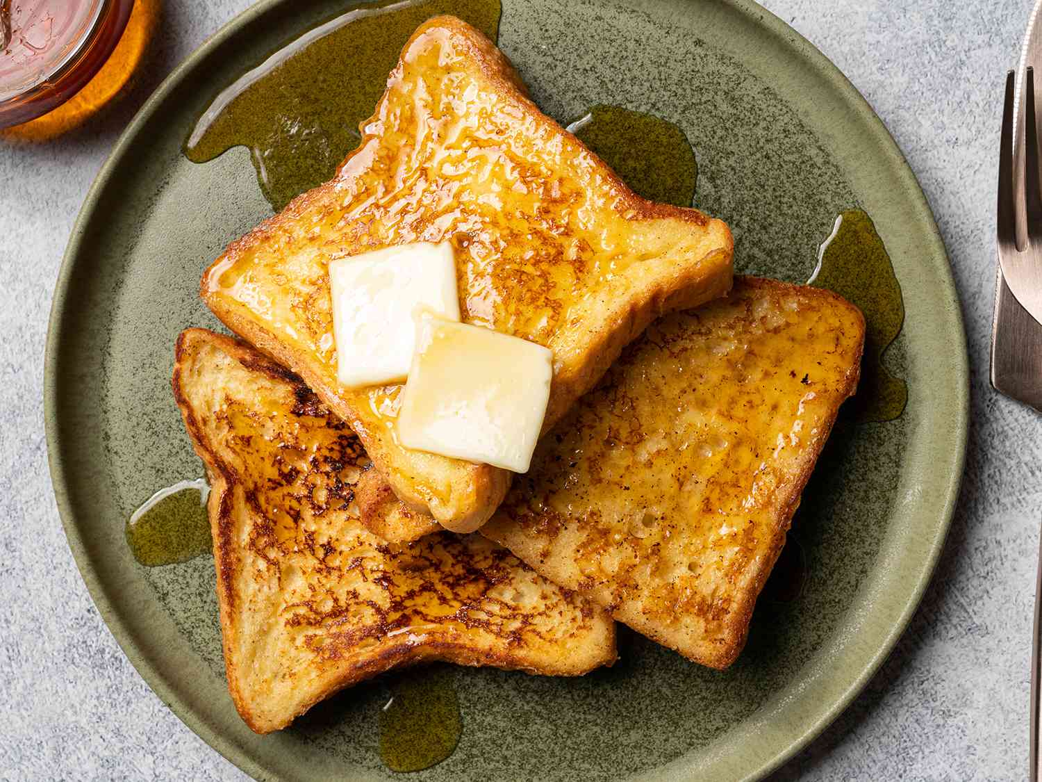 Quick and easy french toast, topped with butter and syrup