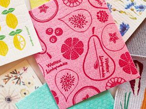 a closeup look at a pink, patterned Swedish dishcloth