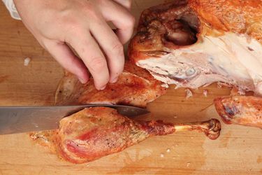 carving a roasted turkey