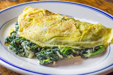 A homemade Florentine omelette with spinach and cheese.