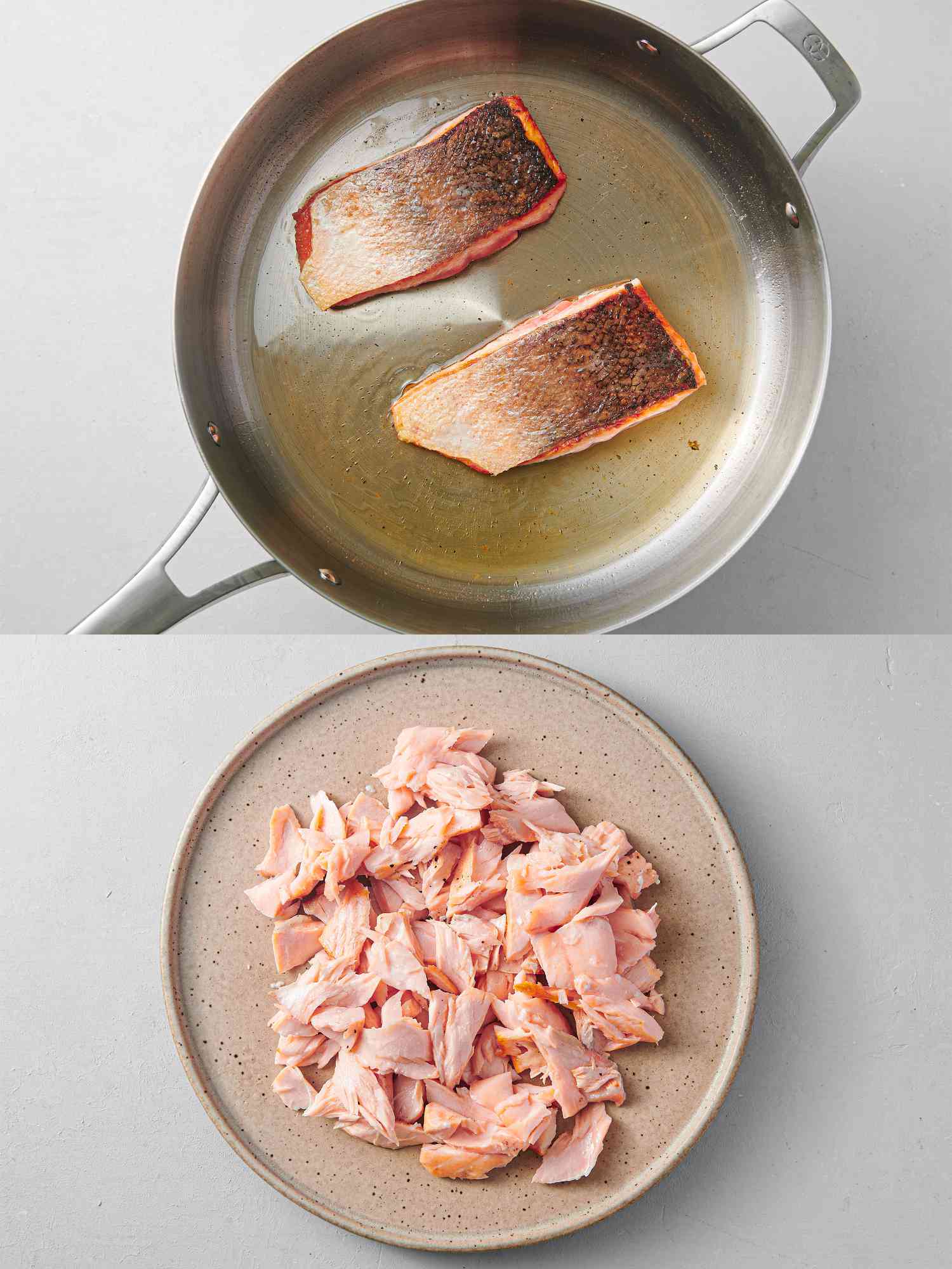 Salmon flipped over inside skillet and cooked, and cooled salmon flaked on plate, with skin discarded
