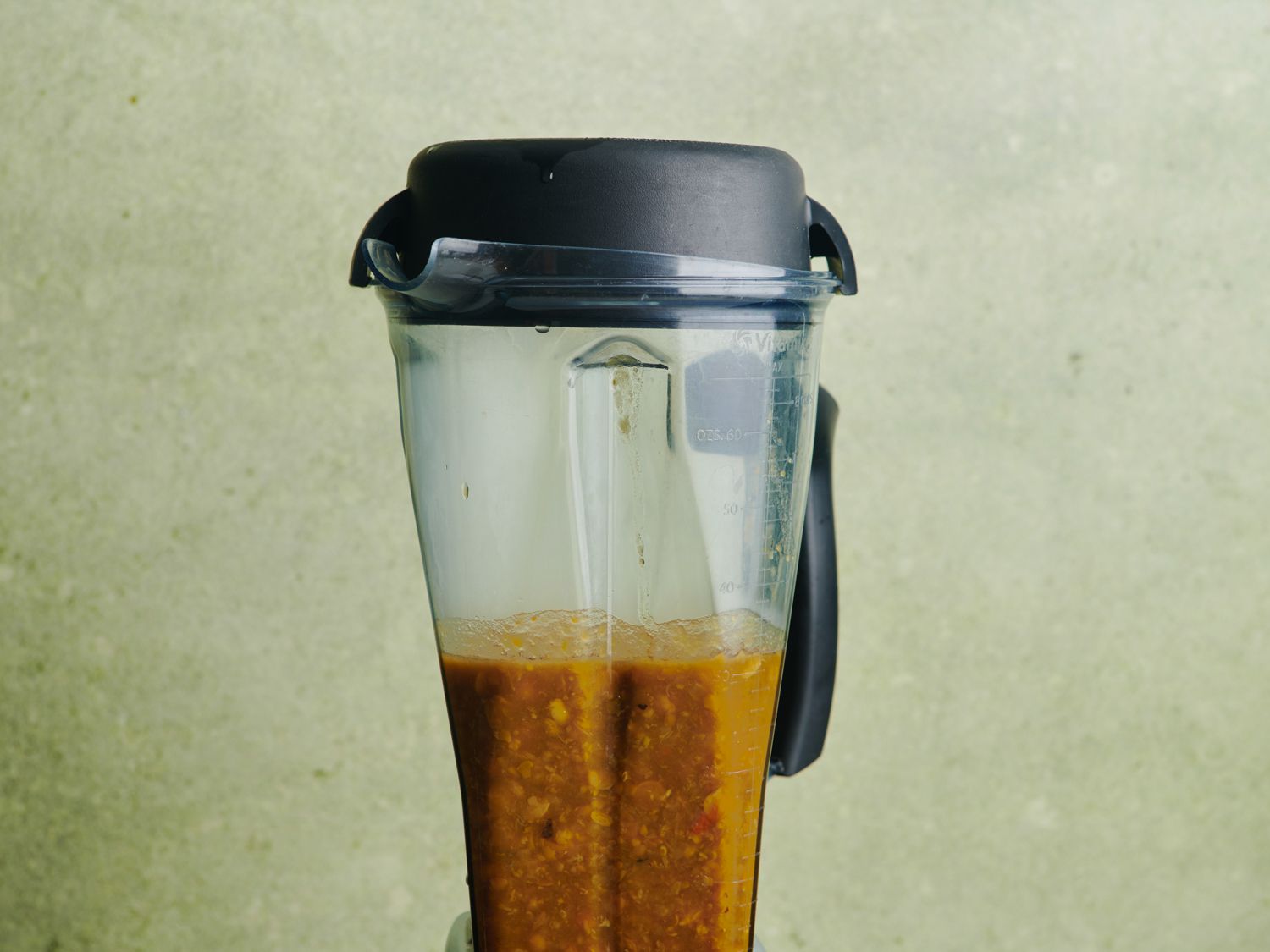 Chickpeas, carrot, garlic, and 1 cup of cooking liquid in a high-powered blender.