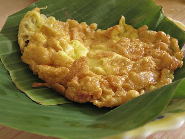 Crispy Thai-style omelette served on banana leaves