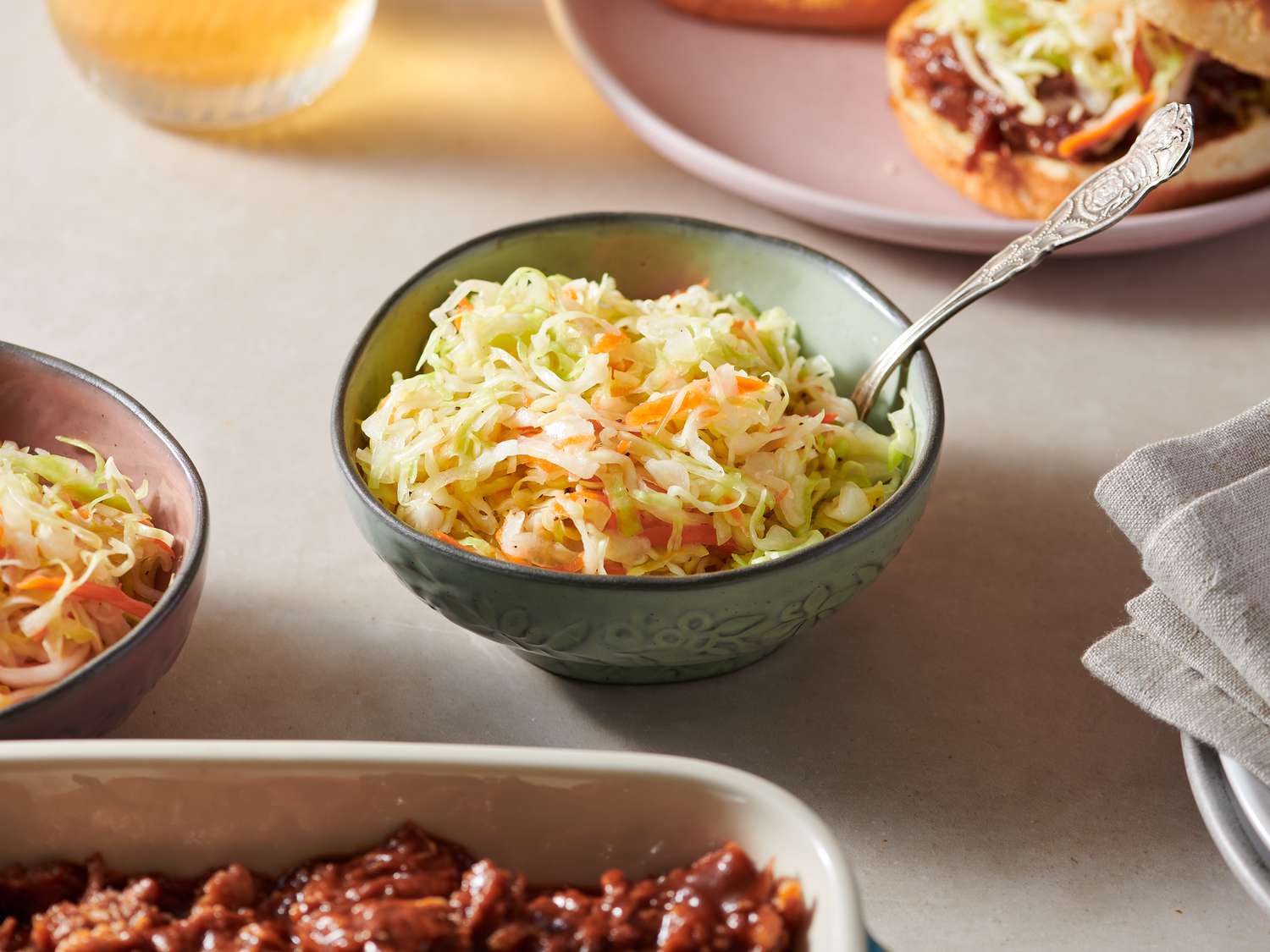 Vinegar coleslaw served inside a small bowl