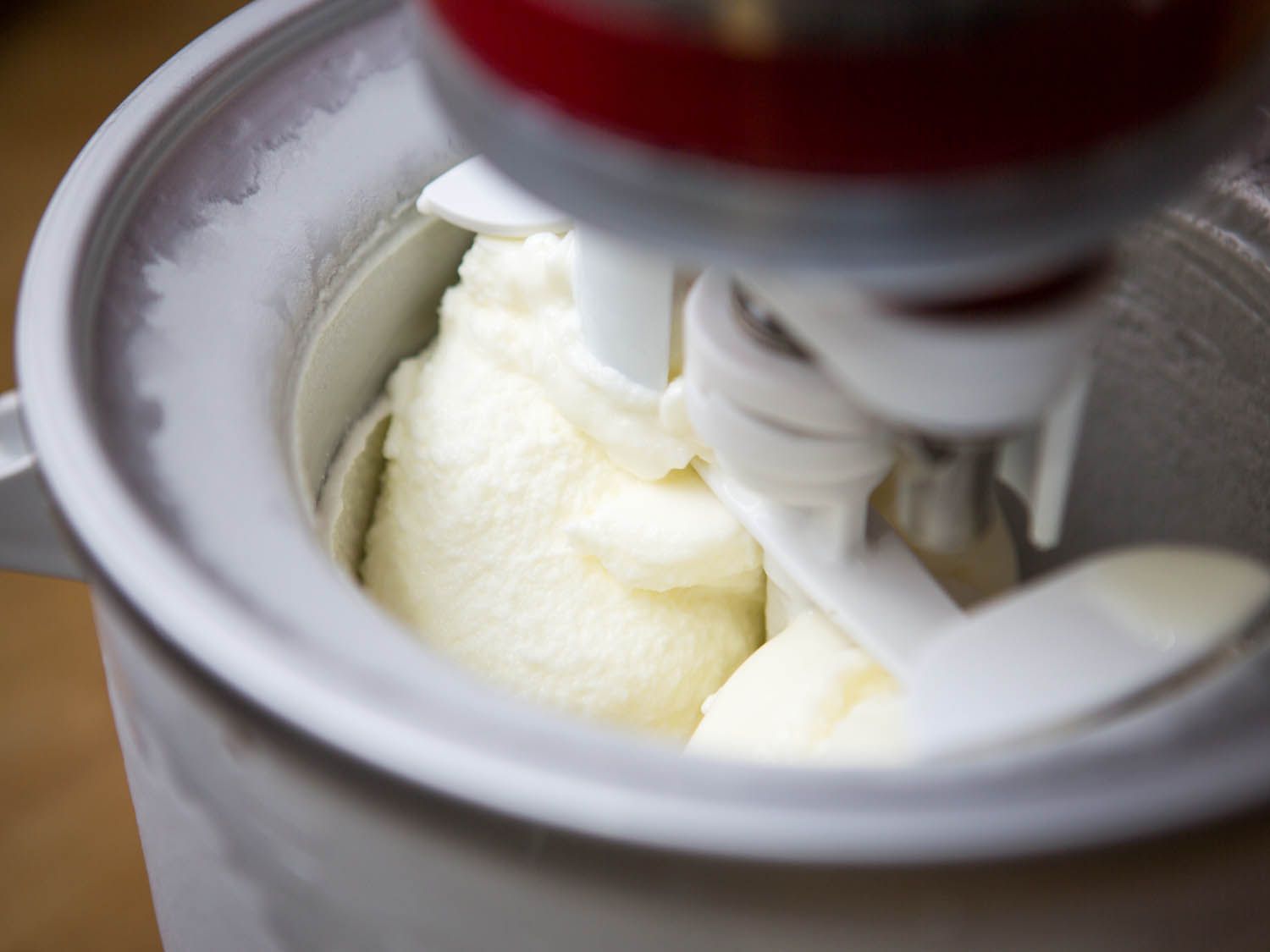 Frozen yogurt churning in an ice cream maker.