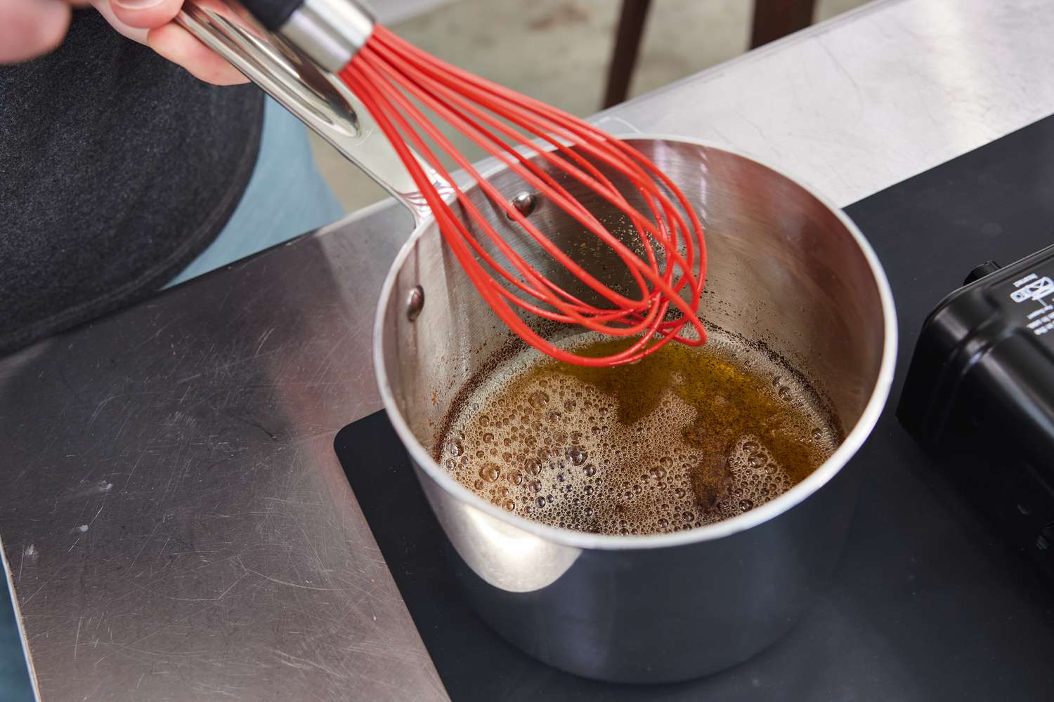 a closeup look at browned butter in a saucepan