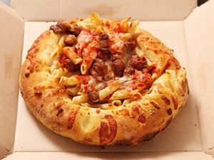 Bread bowl pasta from Dominos in a delivery box