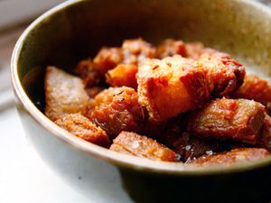 A small bowl of homemade chicharrones