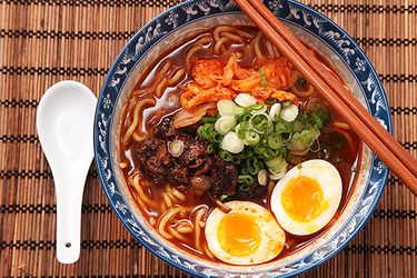 A bowl of homemade shin cup-style spicy Korean ramyum beef noodle soup
