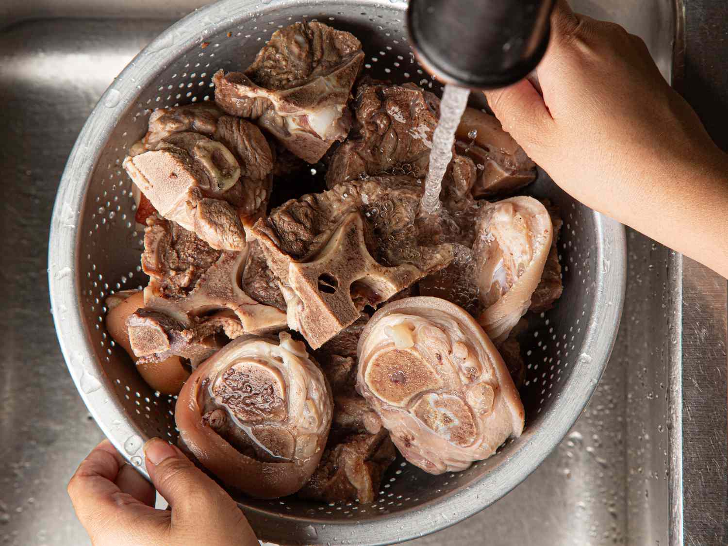 Overhead view of rinsing bones