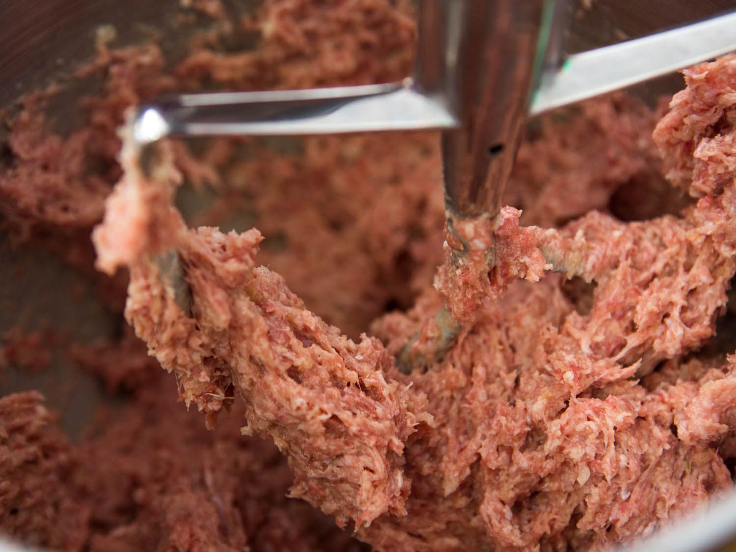 Meat mixing in a stand mixer for Swedish meatballs.