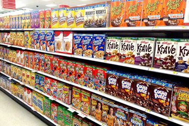 A cereal aisle in a grocery store.