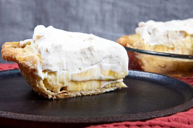 Side view of a slice of banana pie on a plate