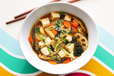 Overhead view of finished soup with chopsticks