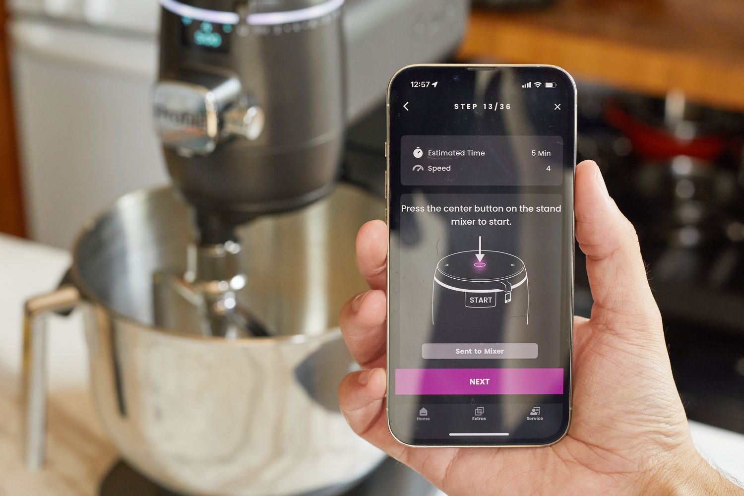 showing the GE stand mixer app on a phone