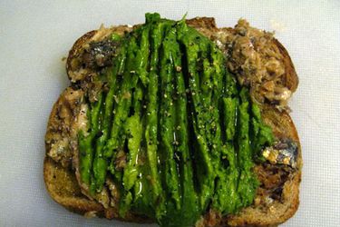 An open-face sardine avocado sandwich