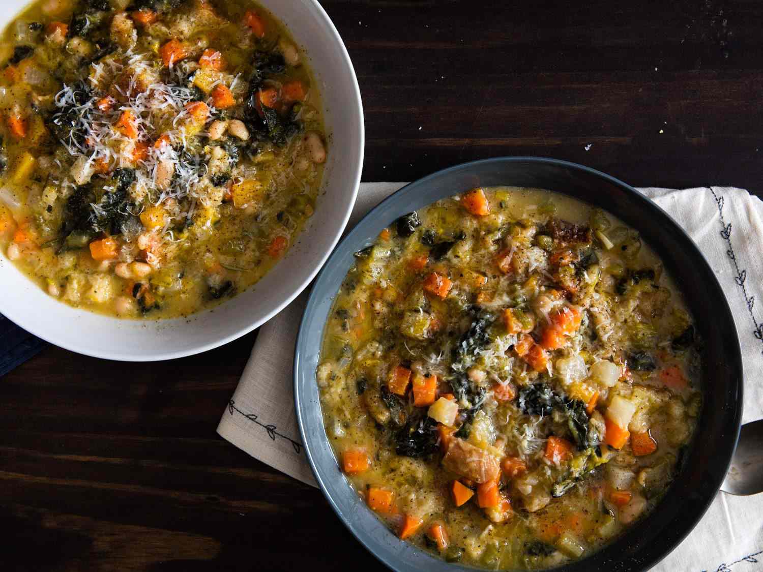 Overhead view of two bowls of ribolita soup.