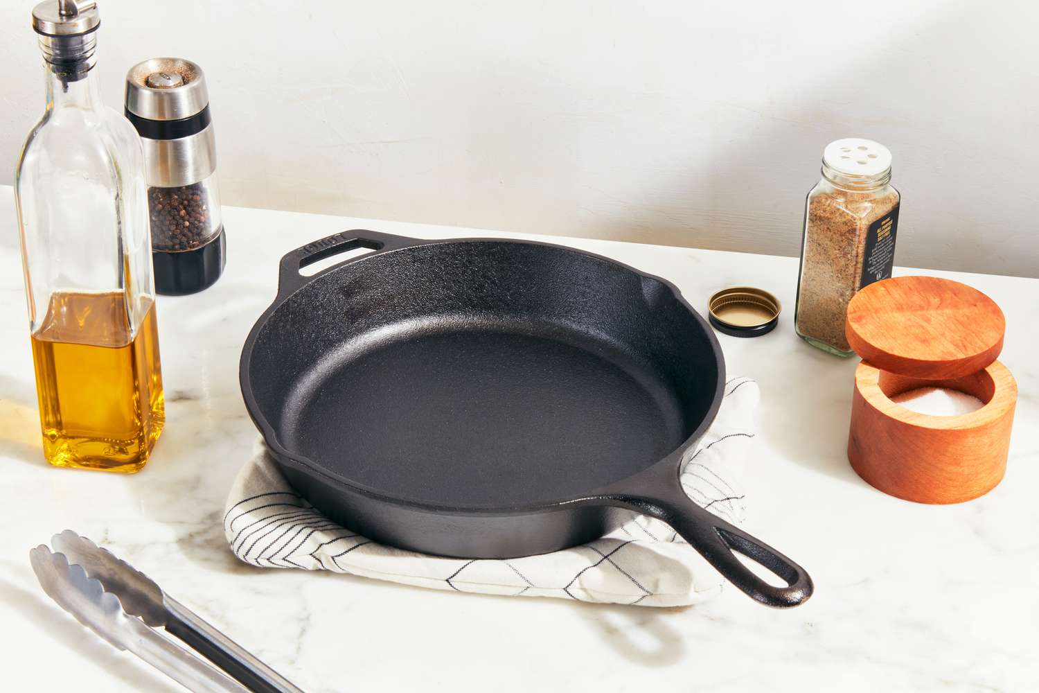 a cast iron skillet on a marble surface