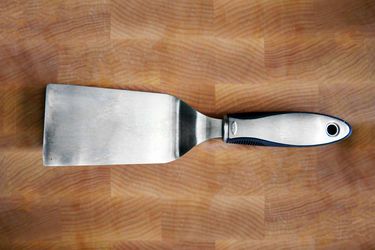 OXO Turner Spatula on a wooden cutting board