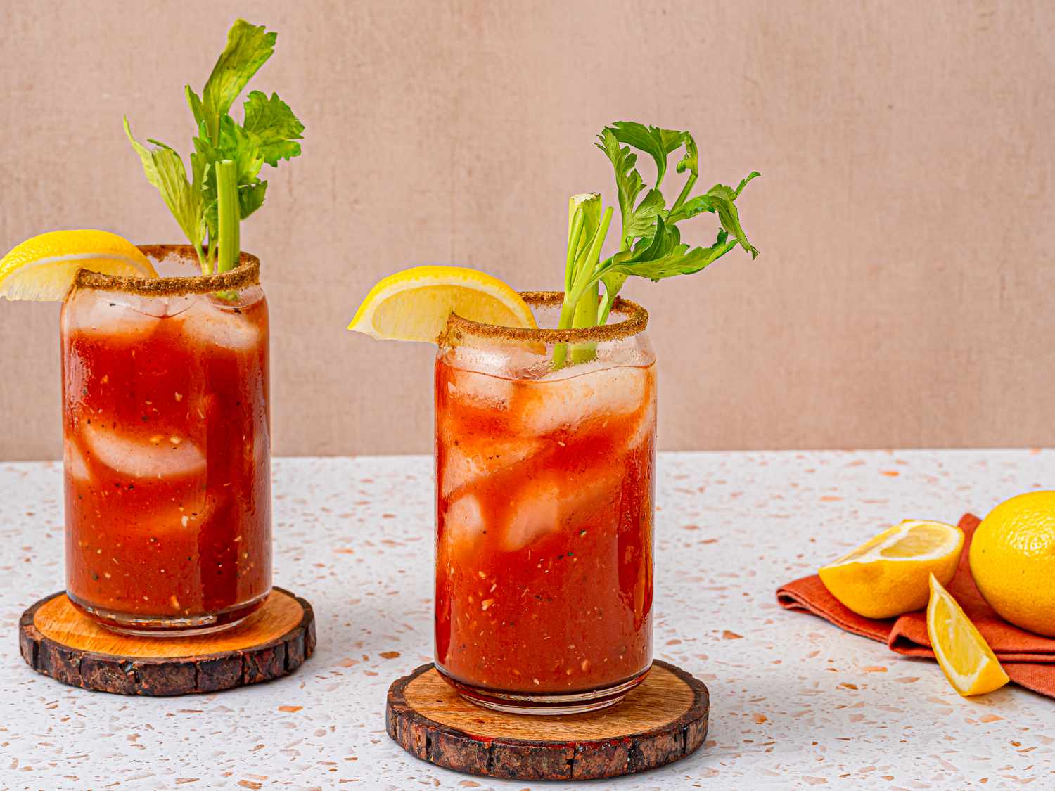 Two bloody marys one wooden costers