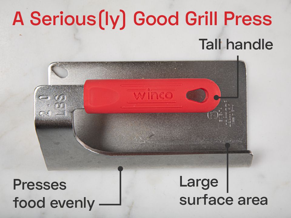 the winco press on a marble surface with the words: a seriously good grill press; tall handle, presses food evenly, large surface area