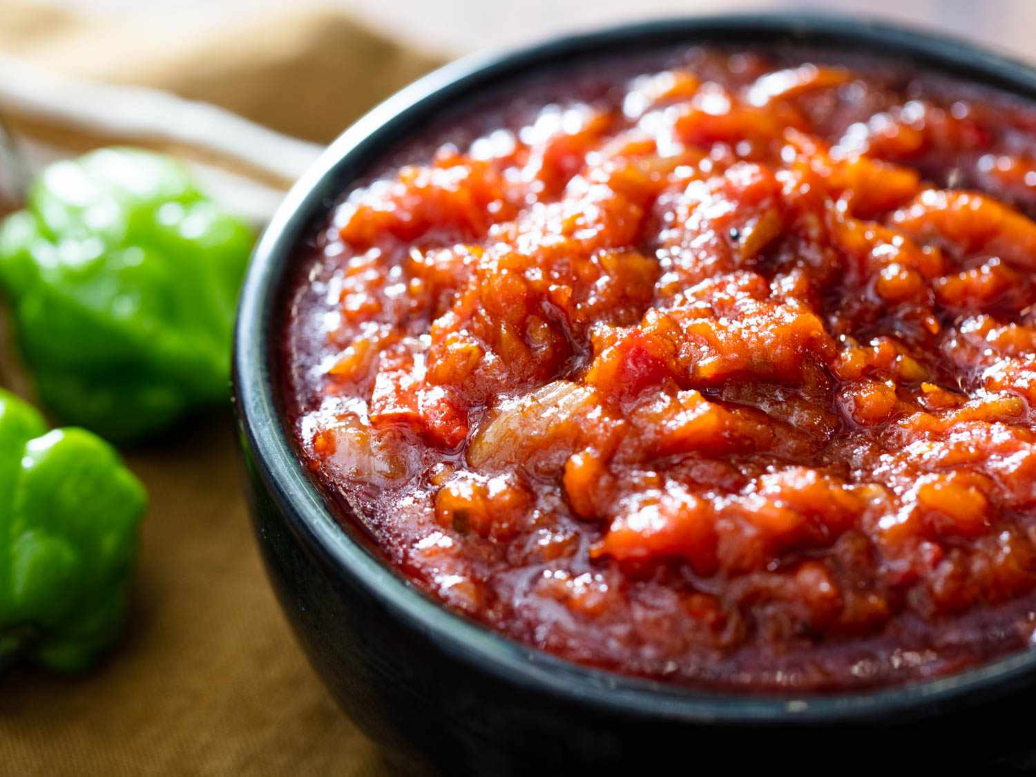 Close up view of a bowl of obe ata reduced into a dip.