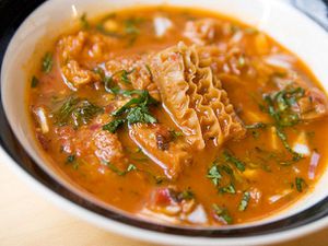 A bowl of menudo, or red chile tripe soup.