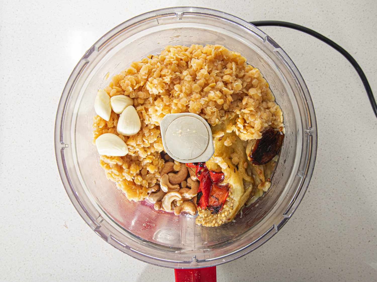 All ingredients for the dip added to a food processor