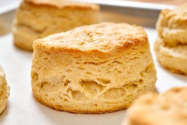 A close up of a freshly baked buttermilk biscuit