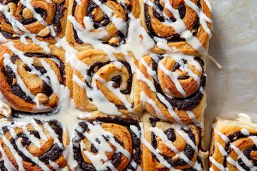 Overhead shot of chocolate hazelnut rolls mascarpone drizzled with glaze